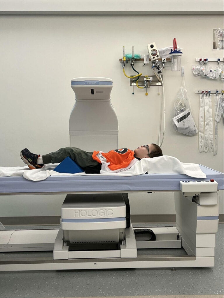 boy lying on high-tech hospital bed